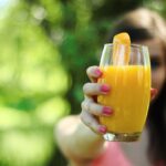 orange juice, healthy, glass, drink, juice, orange, girl, woman, offering, delicious, tasty, vitamins, diet, freshness, juicy, citrus, food, fresh, hands, fingers, nail polish, green food, green healthy, green glass, green diet, green glasses, orange juice, orange juice, orange juice, orange juice, juice, juice, juice, juice, juice